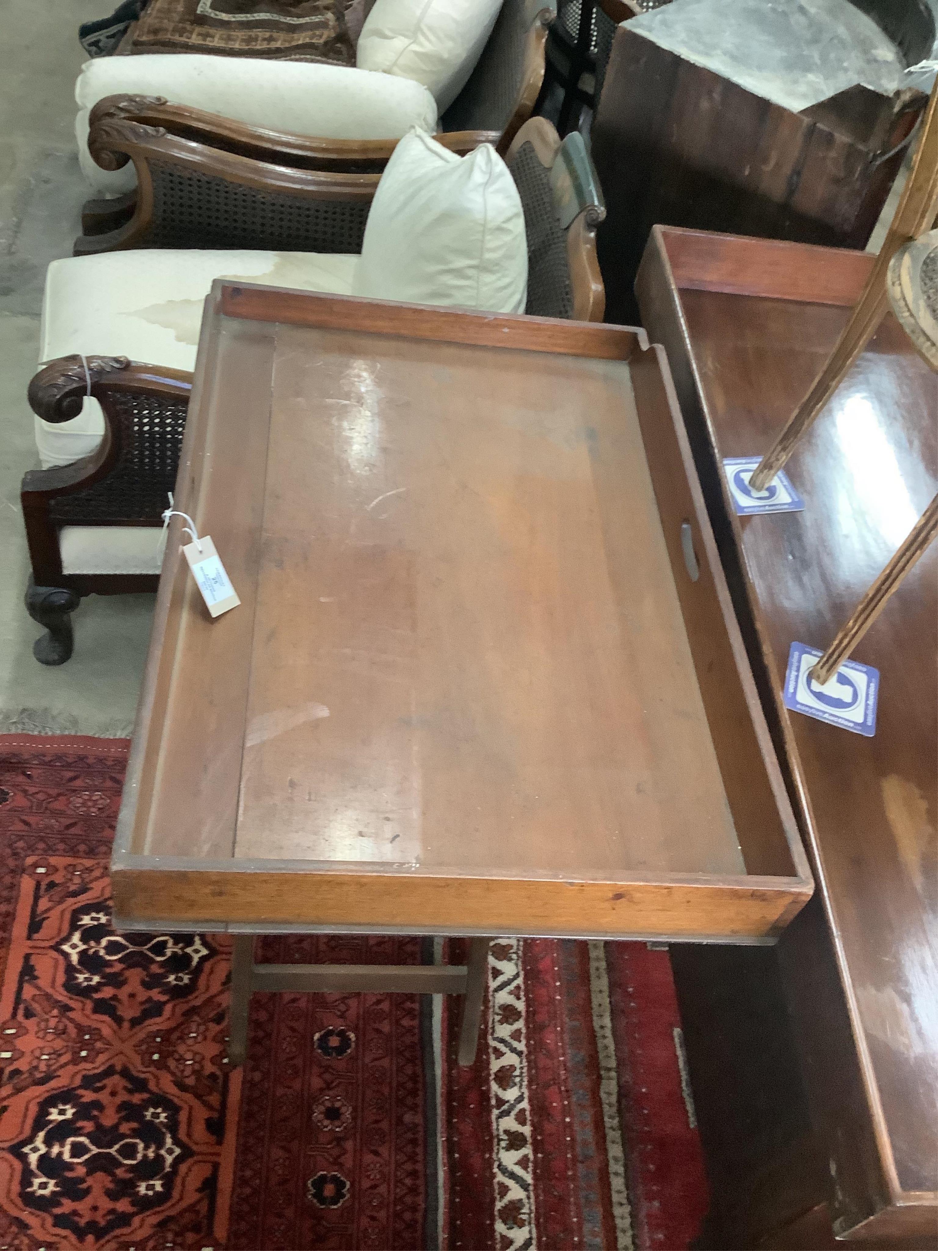 A Victorian rectangular mahogany butler's tray on folding stand, width 78cm, depth 52cm, height 90cm. Condition - fair